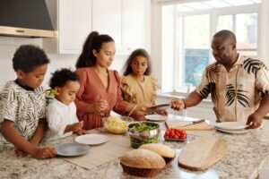 A busy family kitchen in the morning showing the reality of a shared morning routine